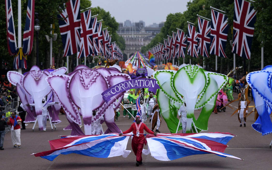Performers parade during the Platinum Pageant in London on 5 June 2022 as part of Queen Elizabeth II's platinum jubilee celebrations.