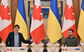 Ukrainian President Volodymyr Zelensky (R) and Canada's Prime Minister Justin Trudeau (L) addresses a joint press conference in Kyiv on May 8, 2022 amid the Russian invasion of Ukraine