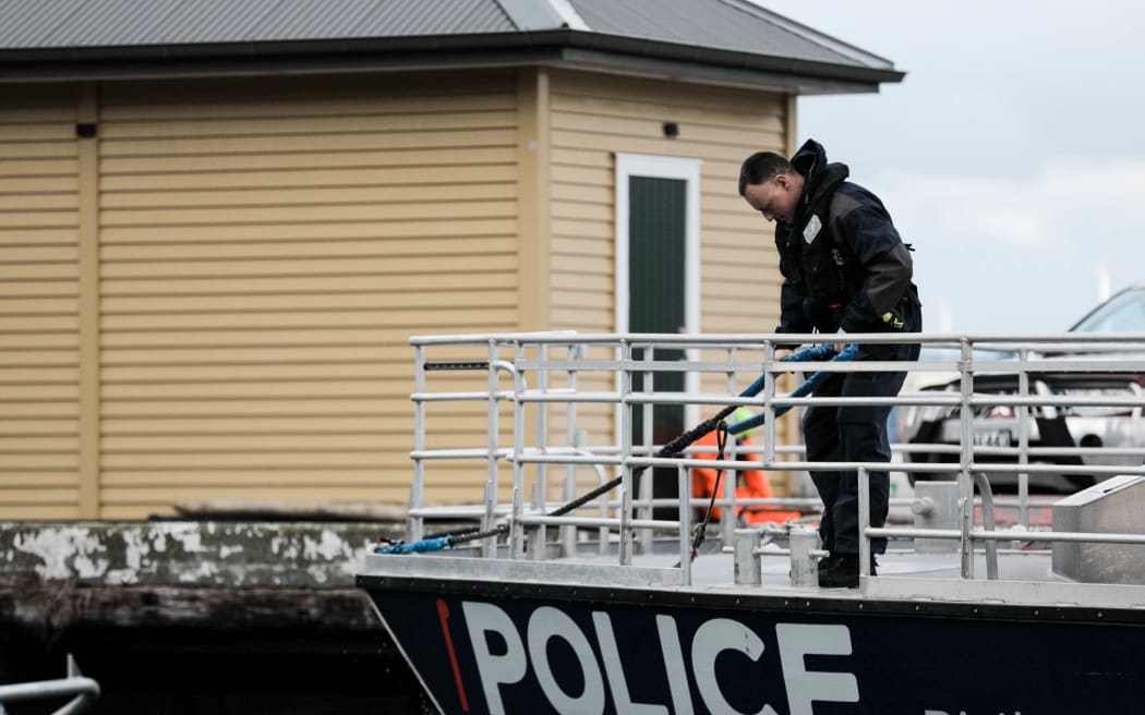 The Wellington police boat returns to harbour on 24 May 2024 after spending the day looking for a man who went missing after falling from the East By West ferry.