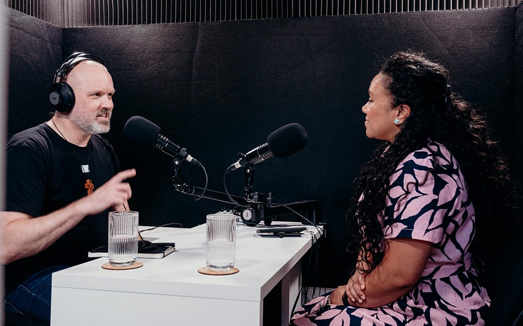 Reverend Frank Ritchie interviewing journalist Indira Stewart.