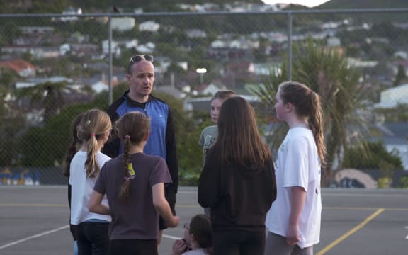 Pete McKinney with his Karori Normal netball team.