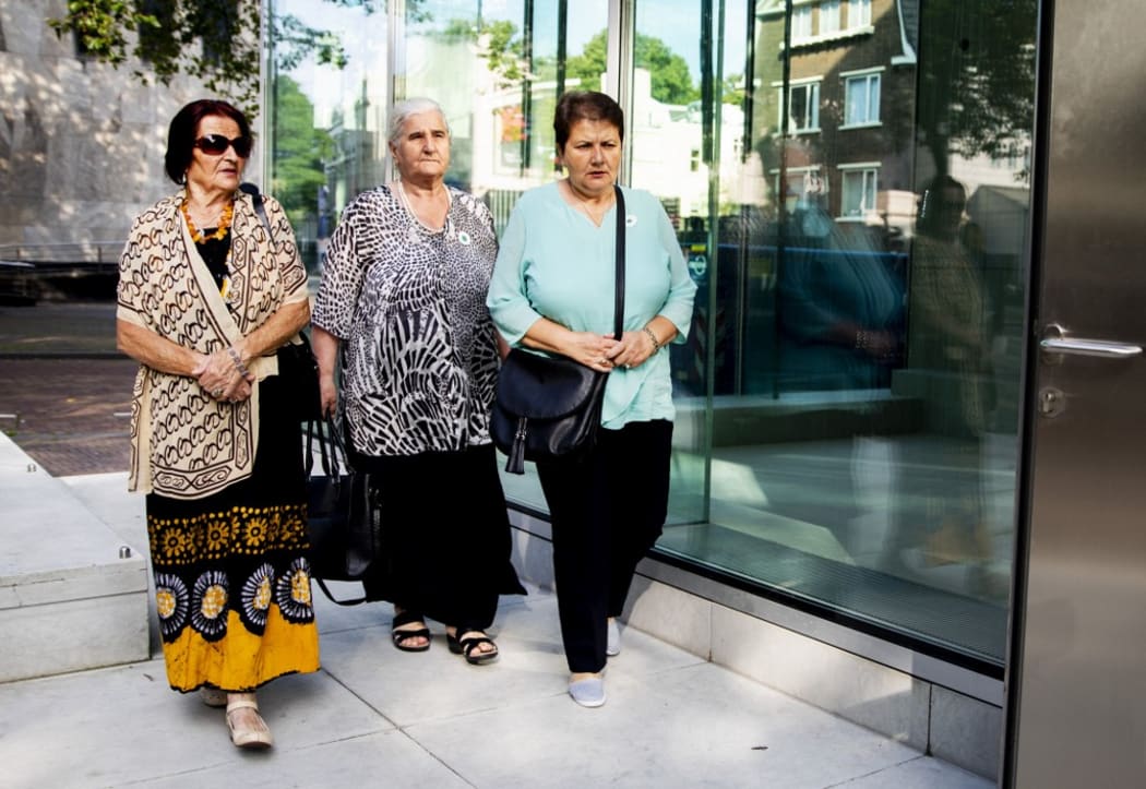 Members of a group of victims' relatives, "the Mothers of Srebrenica" arrive at Dutch supreme court to attend the ruling in the long-running case.