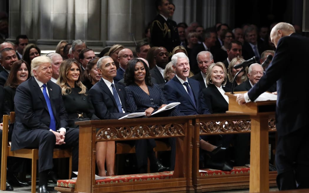 Trump, Melania Trump, Barack Obama, Michelle Obama, Bill Clinton, Hillary Clinton and Jimmy Carter listen as former Sen. Alan Simpson, R-WY., speaks during a State Funeral Funeral former US President George H.W. Bush.