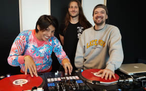 DJs Alphabethead and Spell teach Yadana how to scratch