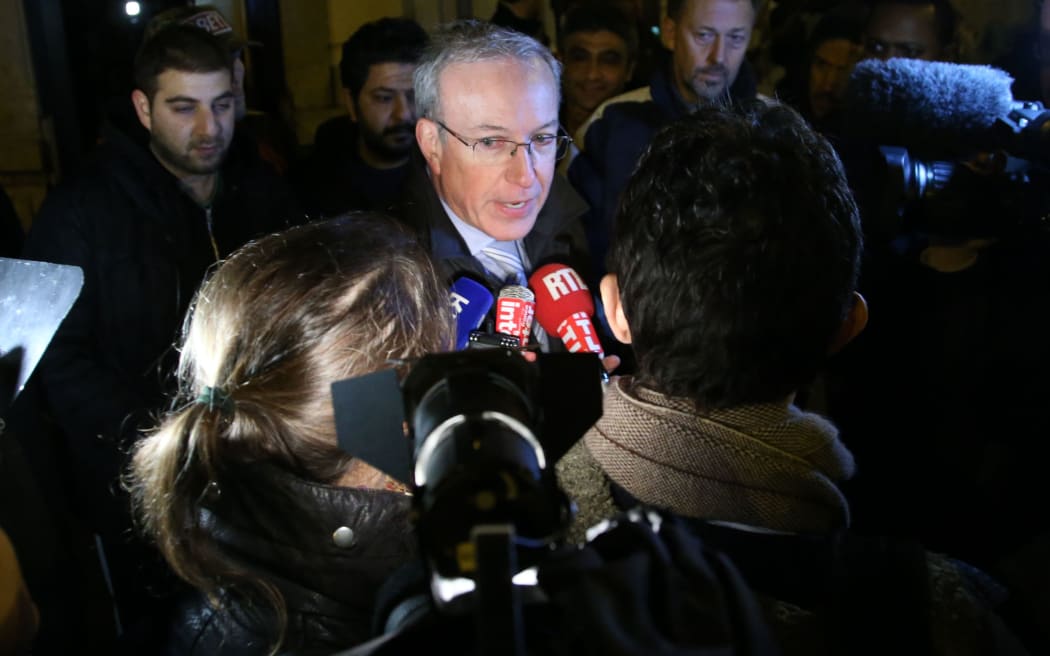 Verviers mayor Marc Elsen talks to journalists