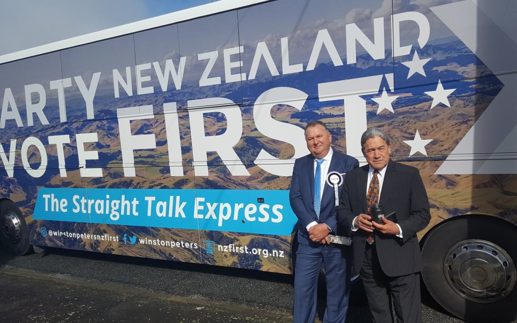 Winston Peters and Shane Jones outside their party's bus.