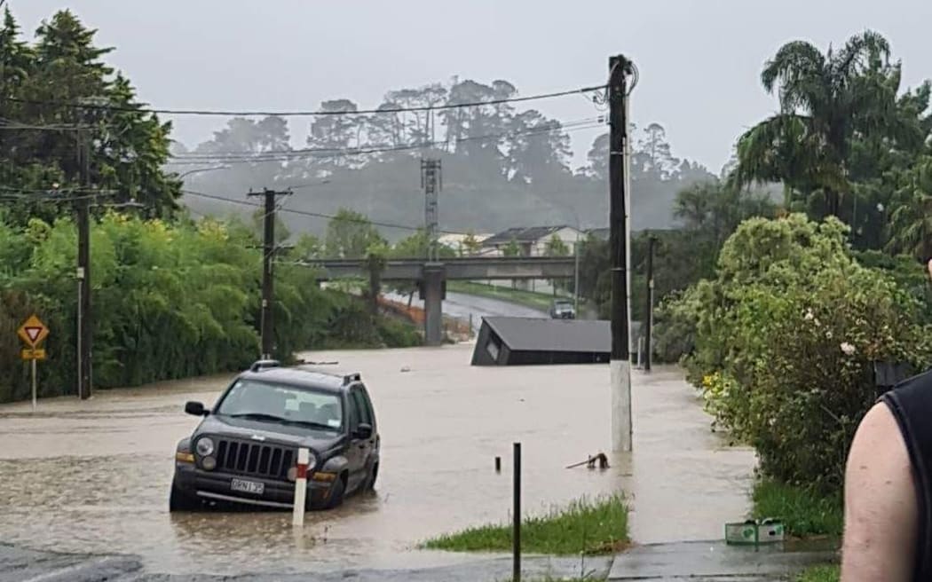Flooding on Candia Road in Henderson Valley, west Auckland on 27 January 2023.