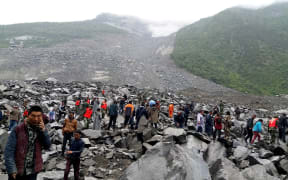 Rescuers working at the accident site.