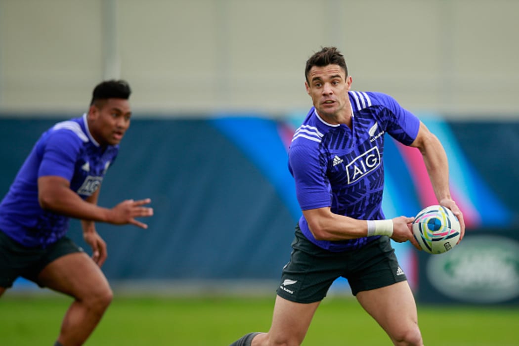 All Black Daniel Carter passes during a New Zealand All Blacks training session.
