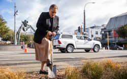 Tory Whanau turning the first sod at the start of the Golden Mile