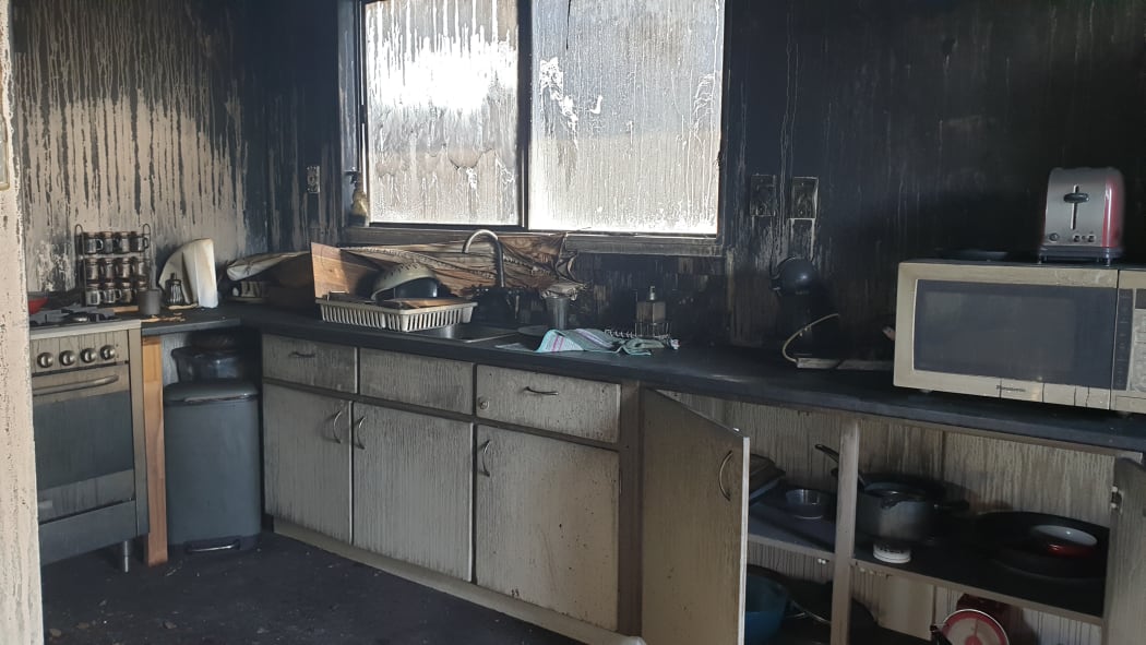 Brittany Nawani says she tried to get a handle on the fire at her Waitara home by using water from her kitchen and kettle but it was already too late.