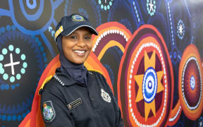 South Brisbane District police liaison officer Aulia Ibrahim wearing the NZ-designed police hijab as part of her uniform.
