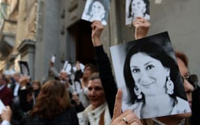 People leave the church of St Francis, after the Archbishop of Malta celebrated mass in memory of murdered journalist Daphne Caruana Galizia on the sixth month anniversary of her death