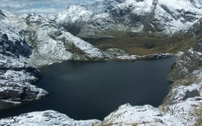Lake Harris after a snowy day. Taken from the path from Harris saddle to Conical Hill.