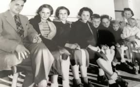 A dutch immigrant family lines up for a photograph