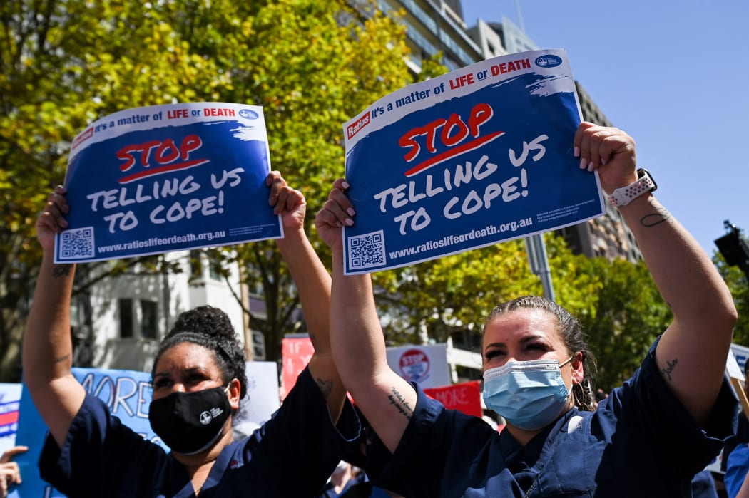 New South Wales public hospital nurses participate in a strike over staff shortages and pandemic-related stresses and strains in Sydney on February 15, 2022.