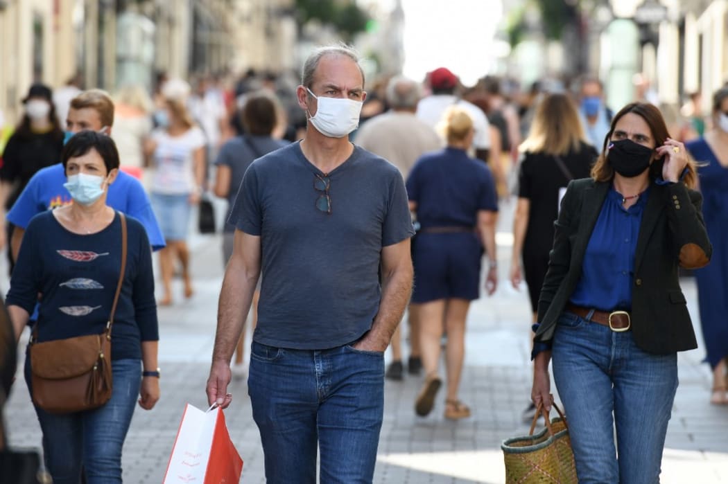 People wearing face masks, to curb the spread of Covid-19 in Nantes, western France.