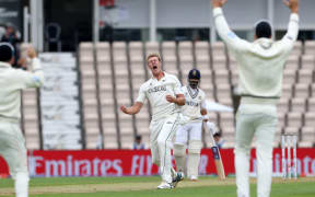 Bowler Kyle Jamieson celebrates the lbw of Virat Kohli.