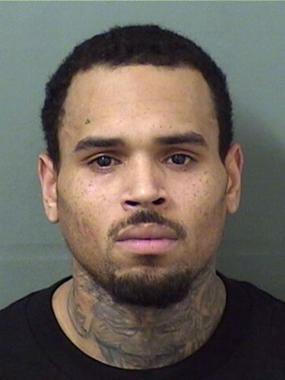 Handout photo provided by the Palm Beach County Sheriff's Office, Chris Brown is seen in a police booking photo after his arrest on charges felony battery on July 5, 2018 in West Palm Beach, Florida.Photo: Palm Beach County Sheriff's Office via Getty Images/AFP