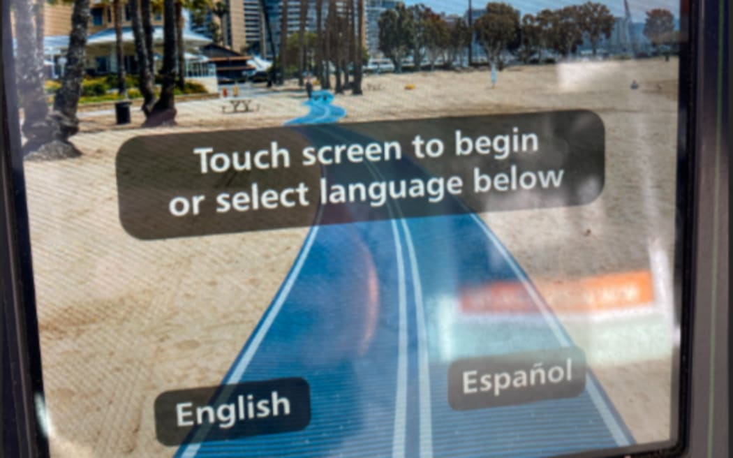 An unforeseen glitch on Tuesday morning linked Hamilton's parking kiosks' system to a network managed by the county of Los Angeles. When drivers went to register their car, they were greeted with a screen showing a road through palm trees and sand and asked if they wanted to continue in Spanish or English.