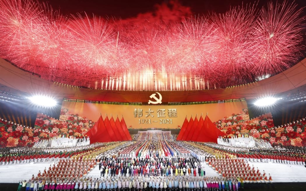 (220106) -- BEIJING, Jan. 6, 2022 (Xinhua) -- An art performance titled "The Great Journey" is held in celebration of the 100th anniversary of the founding of the Communist Party of China (CPC) at the National Stadium in Beijing, capital of China, on the evening of June 28, 2021.