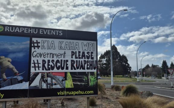 Workers heading into the Winstone Pulp International meeting after the closure of two of its mills.