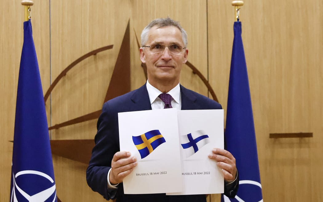 Nato Secretary-General Jens Stoltenberg poses a ceremony to mark Sweden's and Finland's application for membership in Brussels, on 18 May 2022.