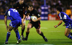 Michael Collins playing for the Chiefs against the Blues in 2004.