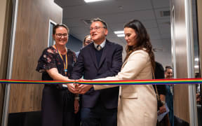 Kelly Kara - Midwife Manager, Kurawaka: Waipapa (left) and Kerianne Harmon-Becks (Ngāi Tūāhuriri) - Māori Midwife student (right) helped Shane Reti cut the ribbon