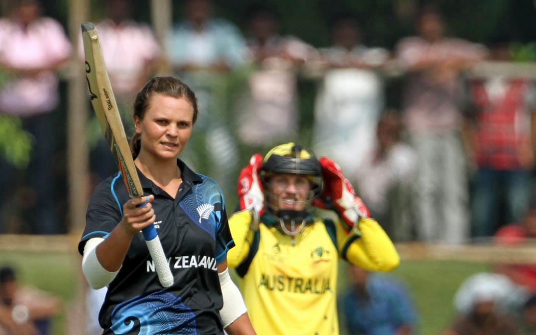 Suzie Bates celebrates scoring a century.