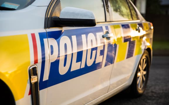 A police car outside a cordon in South Auckland