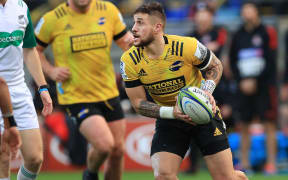 Hurricanes' TJ Perenara looks to pass during the Hurricanes vs Crusaders Super Rugby Aotearoa match at Sky Stadium on Sunday the 21st of June 2020. Photo by Marty Melville / Photosport.co.nz