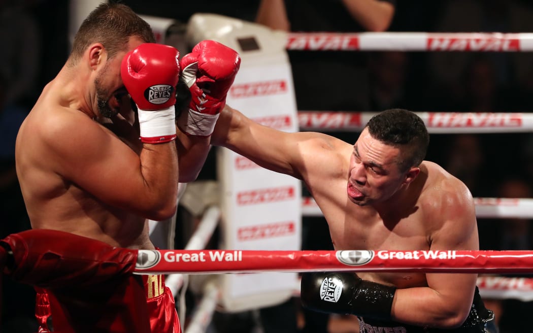Joseph Parker lands a punch during his fight with Razvan Cojanu for the WBO World Heavyweight title.