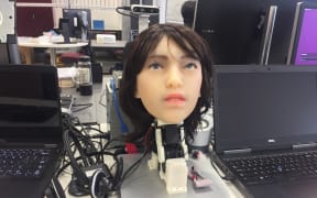 EveR uses a camera to tilt its gaze towards passersby like a possessed bust sculpture.