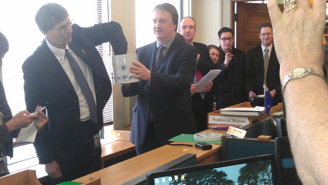 Parliamentary historian John Martin drawing the member's bills out of the ballot at Parliament on Thursday.