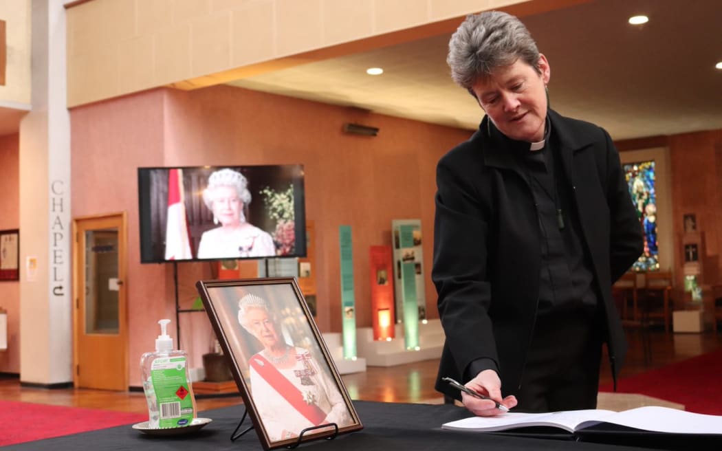 Waiapu Cathedral dean Di Woods by the cathedral's condolence book to the Queen