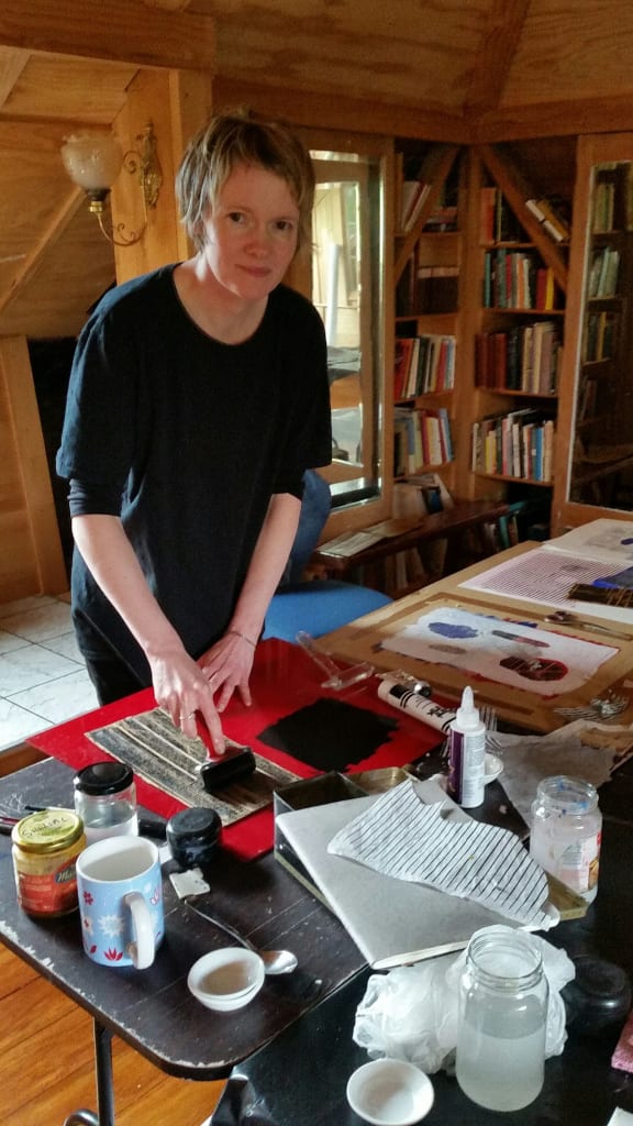 Artist Kirsty Lillico making prints in the clockmakers loft.