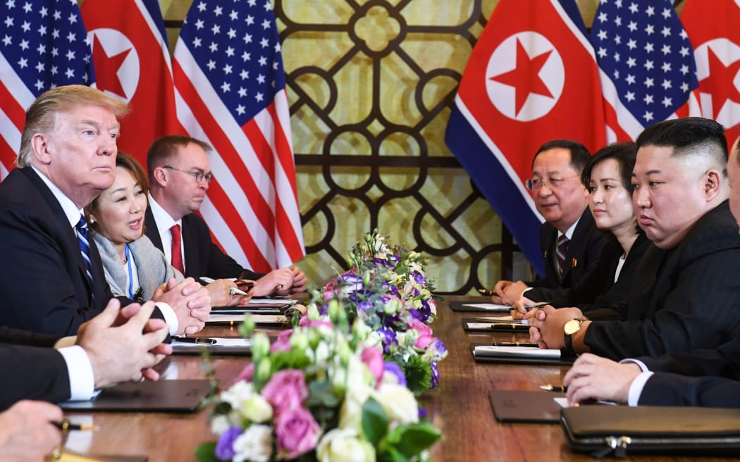 US President Donald Trump (L) and North Korea's leader Kim Jong Un (R) hold a bilateral meeting during the second US-North Korea summit at the Sofitel Legend Metropole hotel in Hanoi on February 28, 2019.