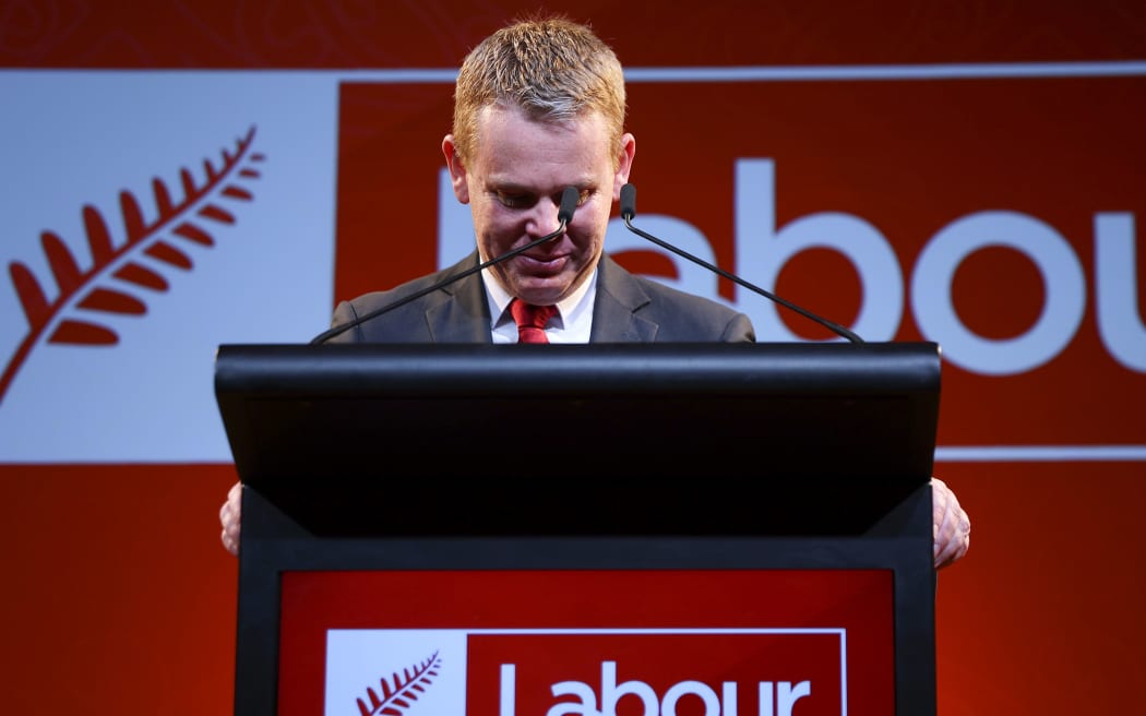 WELLINGTON, NEW ZEALAND - OCTOBER 14: New Zealand Prime Minister and Labour leader Chris Hipkins holds back emotion while speaking during a Labour Party election night event at Lower Hutt Events Centre on October 14, 2023 in Wellington, New Zealand. New Zealanders cast their votes in the country's first post-pandemic general election on Saturday, against the backdrop of multiple natural disasters, rising cost of living pressures and a wave of low-level crime that has gripped the country. (Photo by Hagen Hopkins/Getty Images)