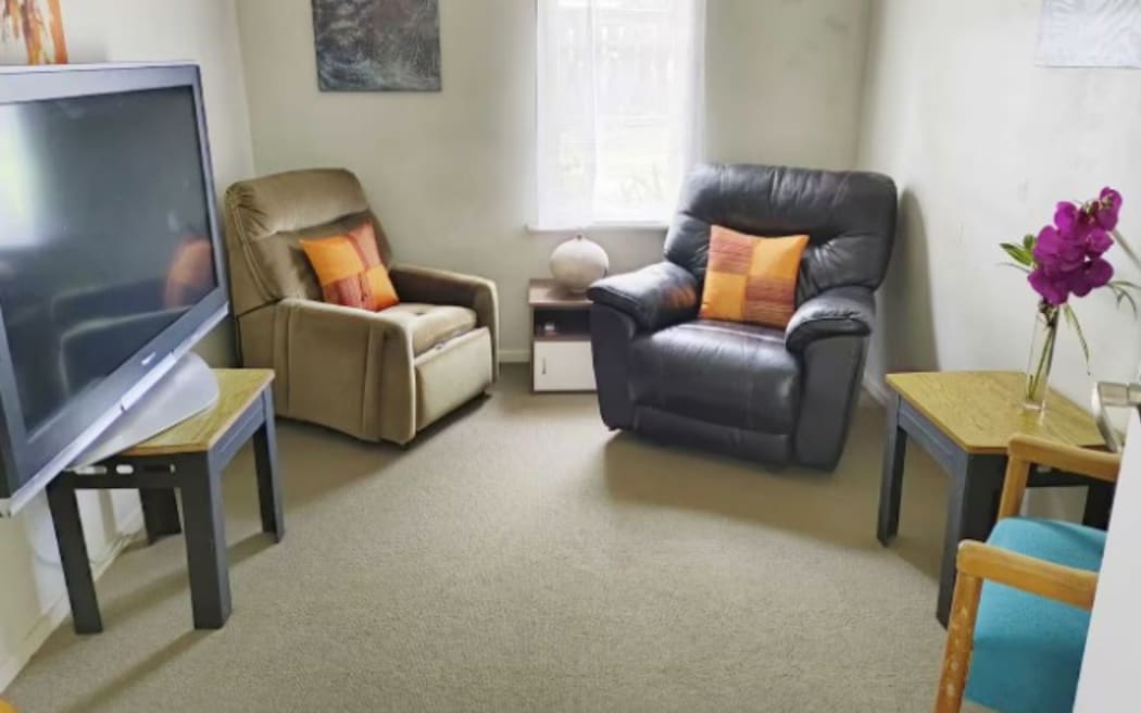 The shared living room at the boarding house in Auckland.
