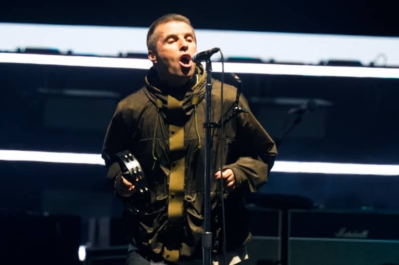 Liam Gallagher, lead singer of British rock band Oasis performs on stage at the Principality Stadium in Cardiff on July 4, 2025.