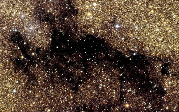 A handout image released on June 23, 2026 by the European Space Agency and taken on March 23, 2025 for a period of 26 hours by the Euclid’s optical camera VIS to wich  the colours were added using observations captured in the summer of 2025 with the Canada-France-Hawaii Telescope’s MegaCam camera (CFHT-Megacam) in Hawaii shows our Milky Way galaxy’s centre. 60 million stars, billions of visible galaxies and image quality never seen before: on June 24, 2026, the European Space Agency (ESA) unveiled the centre of the Milky Way, which should enable the identification of new exoplanets. (Photo by Handout / EUROPEAN SPACE AGENCY / AFP) / RESTRICTED TO EDITORIAL USE - MANDATORY CREDIT "AFP PHOTO /  HANDOUT  / EUROPEAN SPACE AGENCY" - HANDOUT - NO MARKETING NO ADVERTISING CAMPAIGNS - DISTRIBUTED AS A SERVICE TO CLIENTS