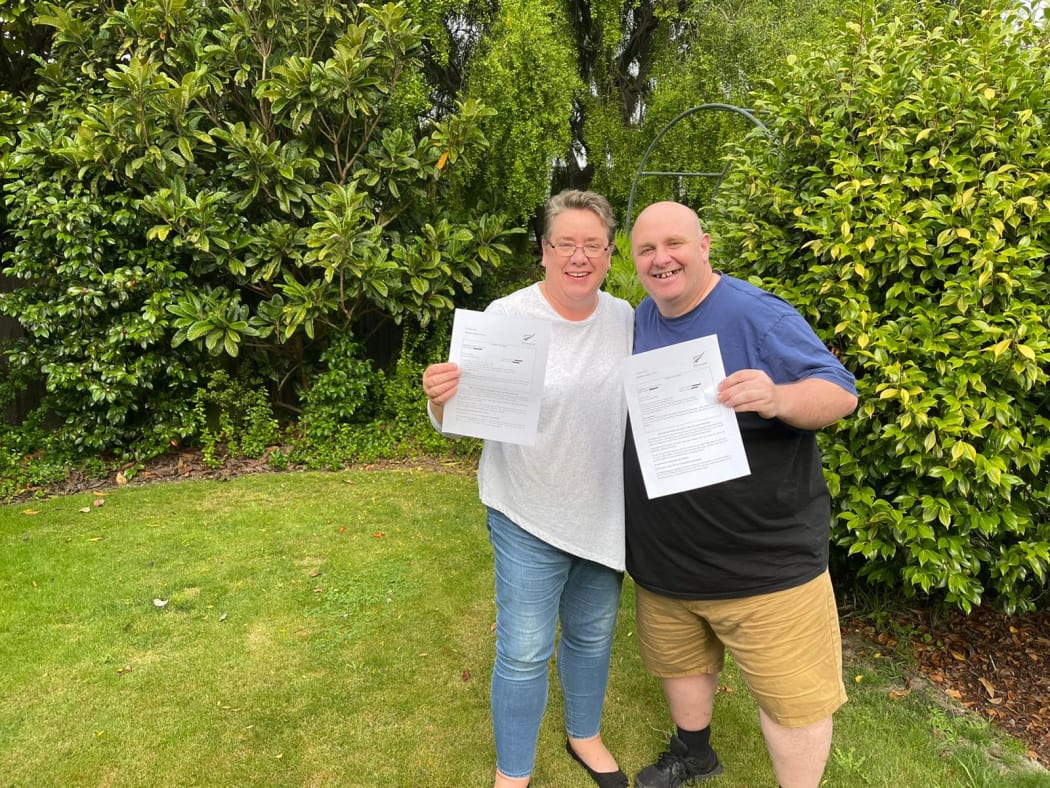 Michelle Shaw and Mic celebrate their permanent residency.