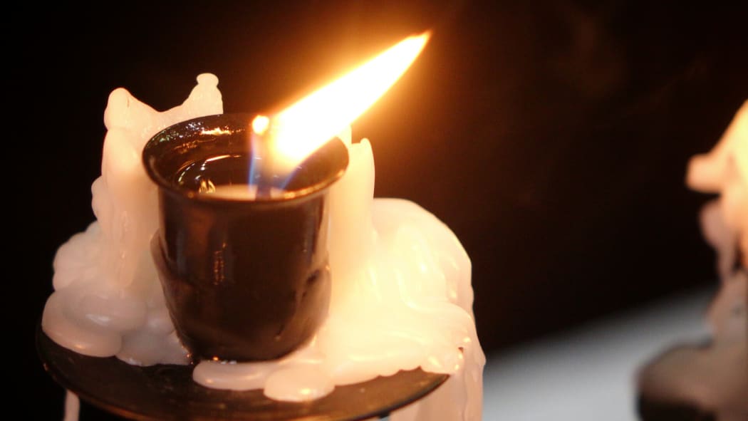 Forty candles were lit at the service, one for every year of Jonah Lomu's life.