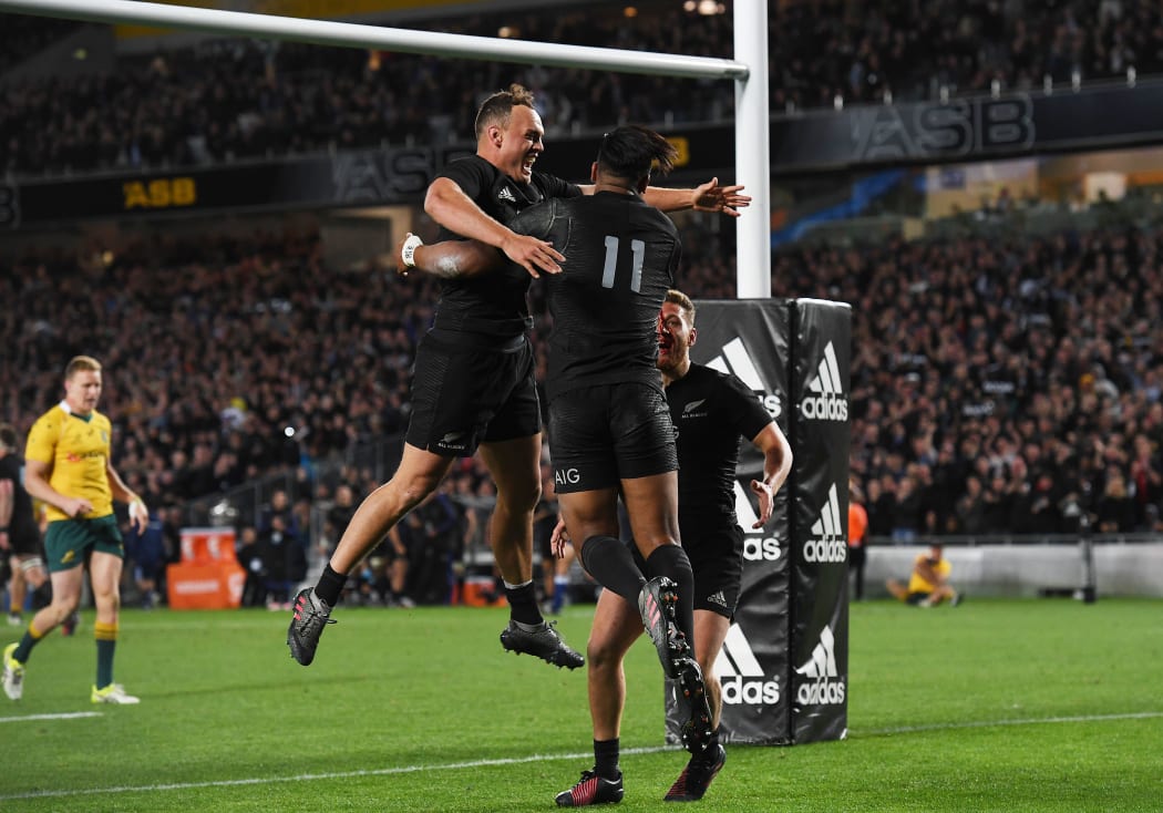 Julia Savea and teammates celebrate his try in the record-setting match against the Wallabies.