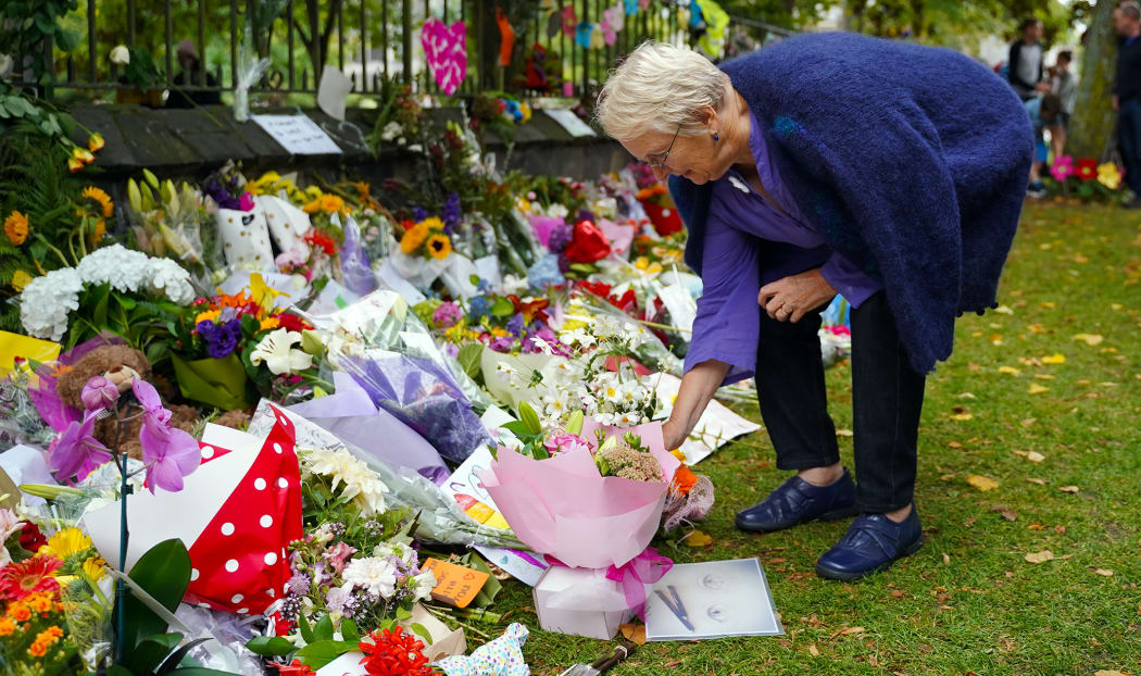 Christchurch residents lay wreaths and condolence cards for those killed at two mosques in the city.