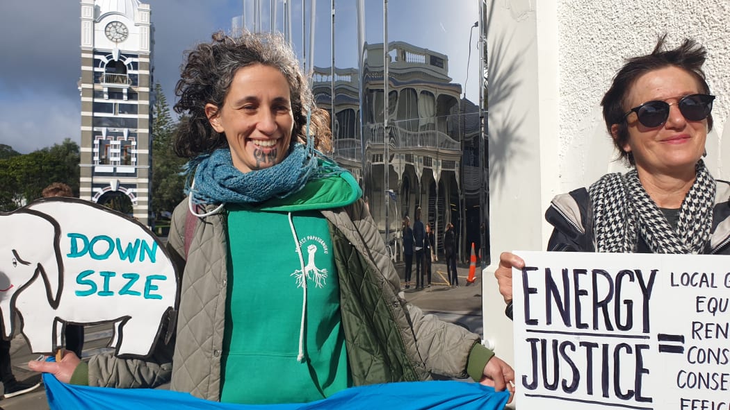 Emily Bailey from Climate Justice Taranaki was taking a stand at the launch of Ara Ake - Future Energy Development Centre in Taranaki.