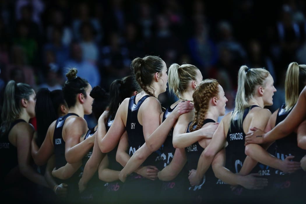 Silver Ferns lineup for the national anthem.