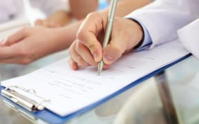 Doctor writing