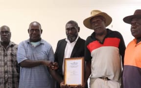 The Autonomous Bougainville Government (ABG) has approved a five-year extension of Exploration Licence to Isina Resource Holdings Limited. The licence was presented to company representatives by the ABG Minister for Mining and  President Ishmael Toroama, middle, at Arawa. 26 March 2025